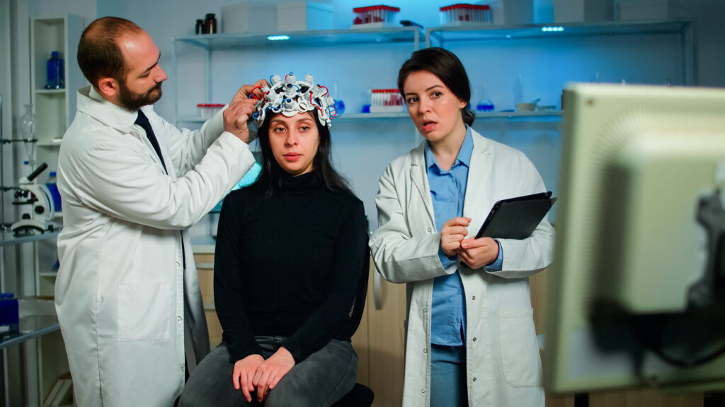 Woman doctor explaning tomography scan from monitor computer